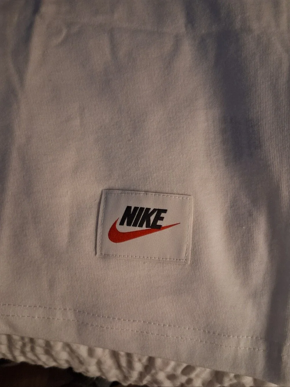 Nike White Short-Sleeve Tee with Blue Comic Graphic and Yellow Accent